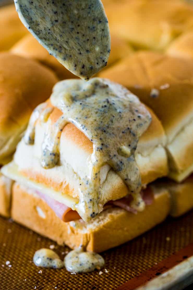 Sweet Ham and Swiss Sliders are a perfect party food and can be baked whenever you're ready to eat, so they're always hot and melty for your guests!