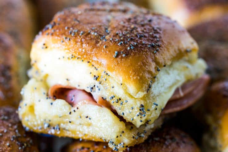 Sweet Ham and Swiss Sliders are a perfect party food and can be baked whenever you're ready to eat, so they're always hot and melty for your guests!