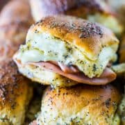 Sweet Ham and Swiss Sliders are a perfect party food and can be baked whenever you're ready to eat, so they're always hot and melty for your gue