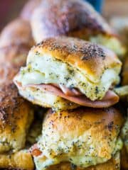 Sweet Ham and Swiss Sliders are a perfect party food and can be baked whenever you're ready to eat, so they're always hot and melty for your gue