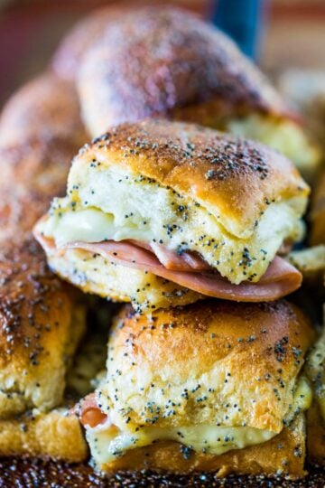 The Best Baked Sweet Ham and Swiss Sliders-- sweet, cheesy, goodness.