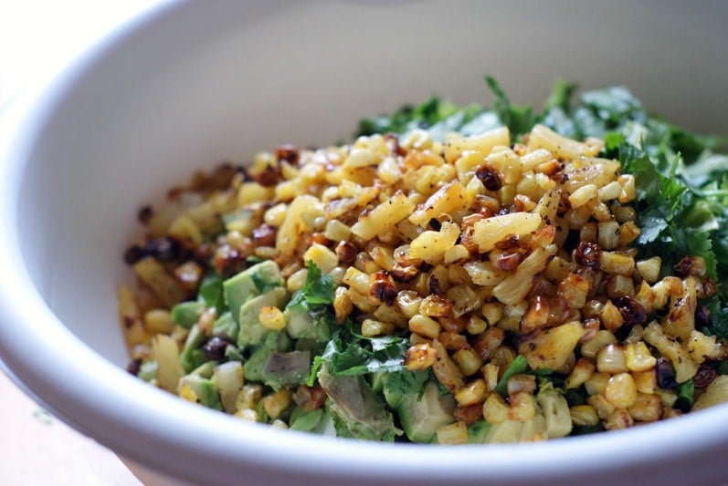 Quick Chicken Chopped Salad with BBQ and corn and pineapple in a large white bowl.