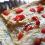 cheese enchiladas baked in glass dish