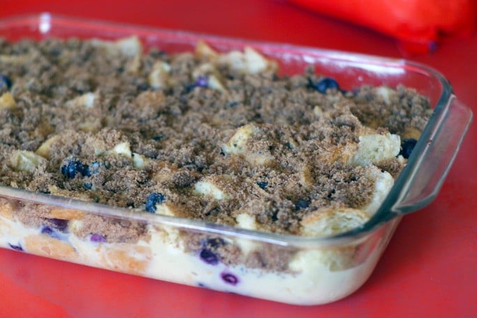 unbaked blueberry french toast casserole in glass dish