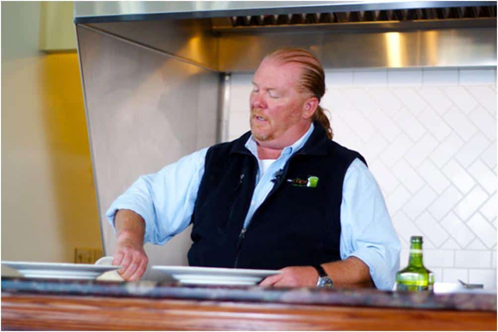 Mario Batali cooking in a kitchen