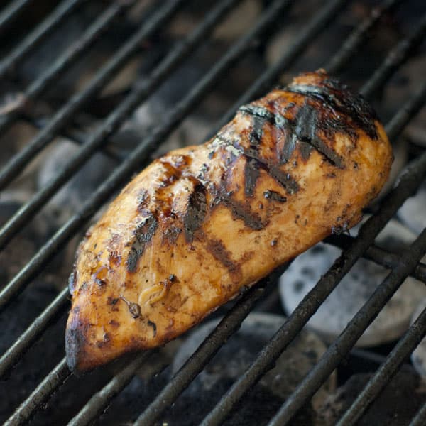 Grilled chicken breast on the grill