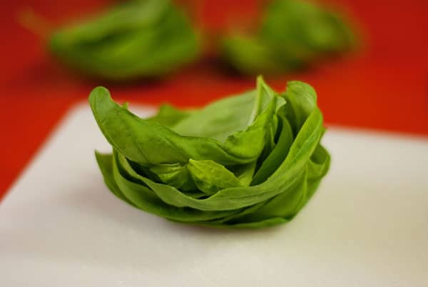 a stack of fresh basil leaves