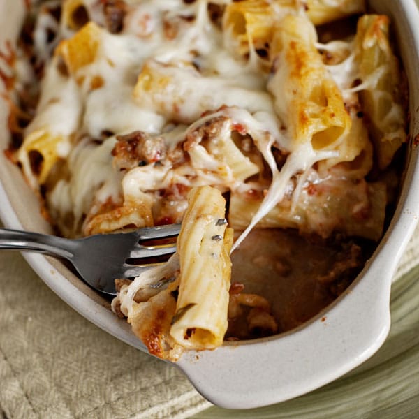 Pasta Al Forno on a fork in a baking dish