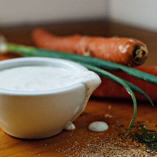 homemade ranch dressing in a white bowl