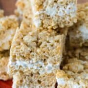 These Ultimate Rice Crispy Treats are perfectly soft and chewy with an irresistible layer of marshmallow cream that makes them far from ordinary.