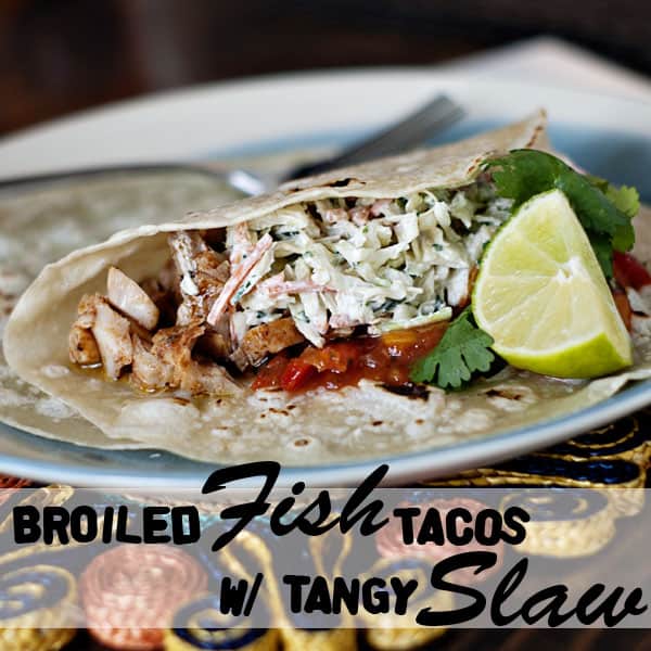 Broiled Fish Tacos with Tangy Slaw on a blue and white plate