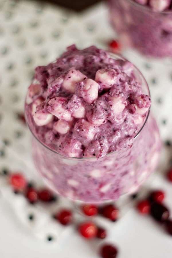 Cranberry Marshmallow Salad in glass cup with fresh cranberries