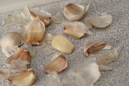 Peeled garlic on a table.