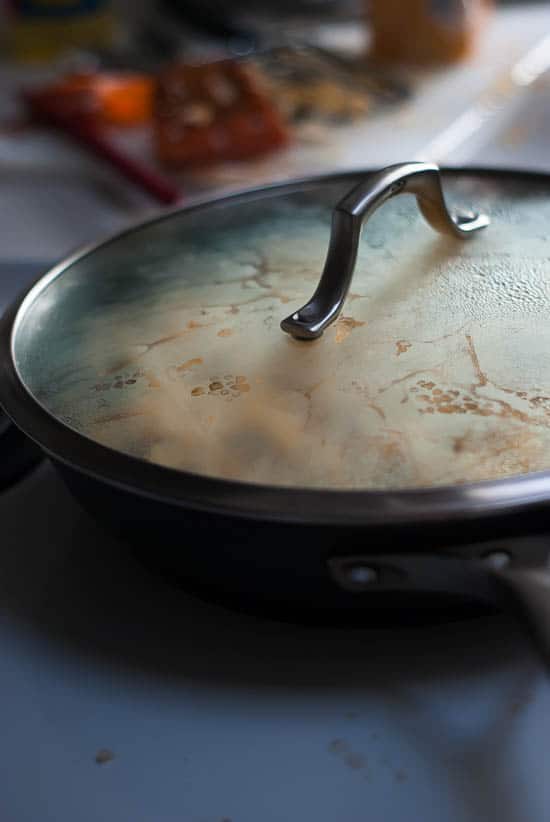 Homemade Beef Enchilada Skillet covered with a lid.