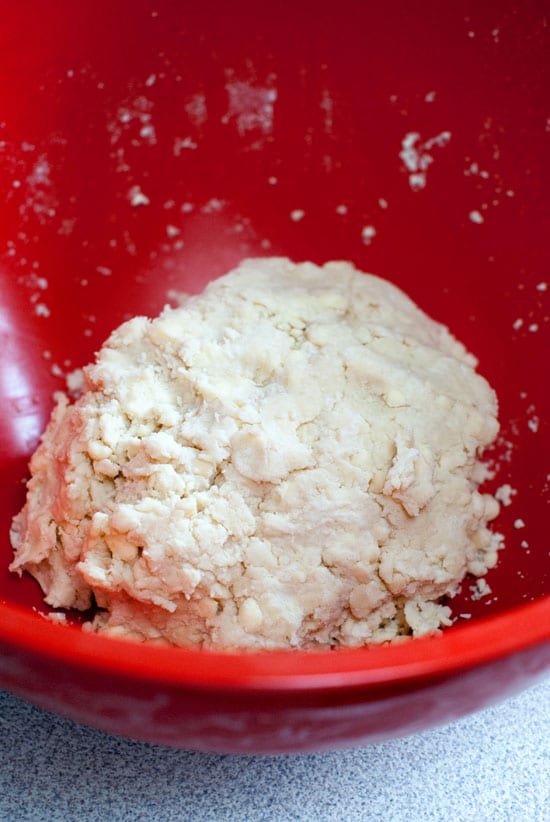 Pie Crust recipe in a large red mixing bowl.
