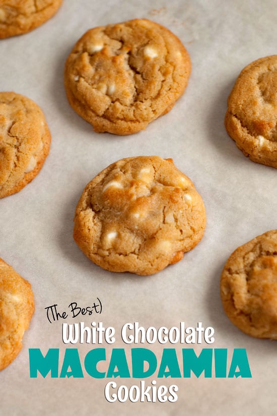 Homemade White Chocolate Macadamia Nut Cookies on parchment paper.