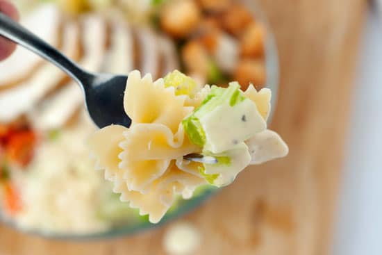 Fast Chicken Caesar Salad on a silver fork.