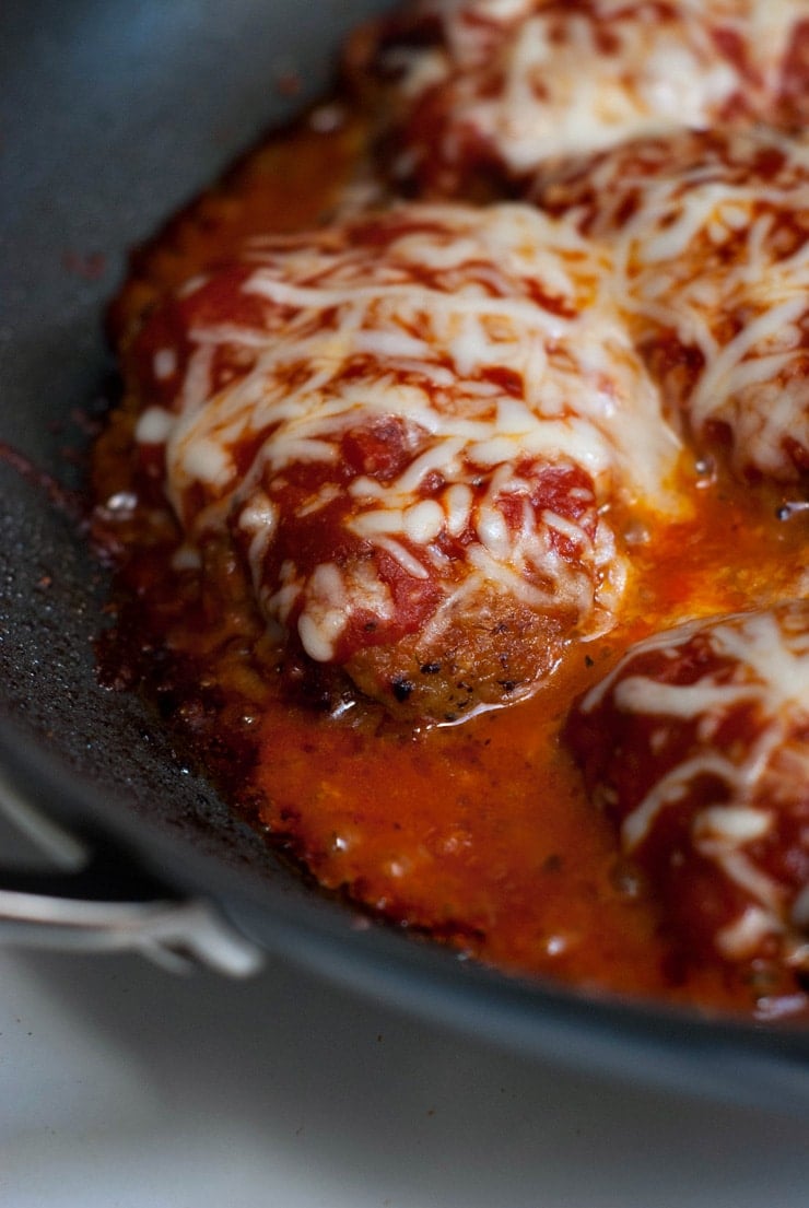 delicious Beef Parmesan recipe in a black skillet.