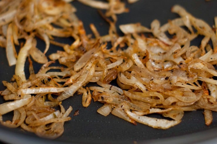 Delicious Caramelized Onions in a cooking skillet.