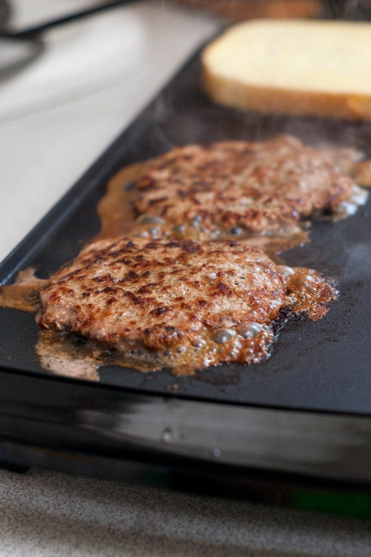 Grilling two Burger Patties.