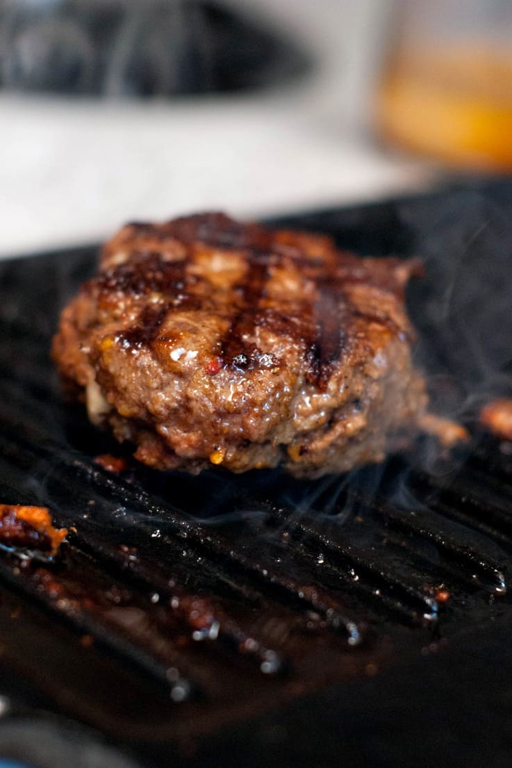 Grilling a Pepper Jack Stuffed Doritos Burger.