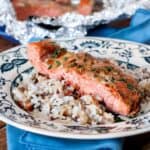 Real Maple Syrup, fresh garlic, and soy sauce make the perfect marinade for this Maple Garlic Baked salmon  It's lightly sweet and caramelizes so well, you'll never eat salmon another way again. ;) 