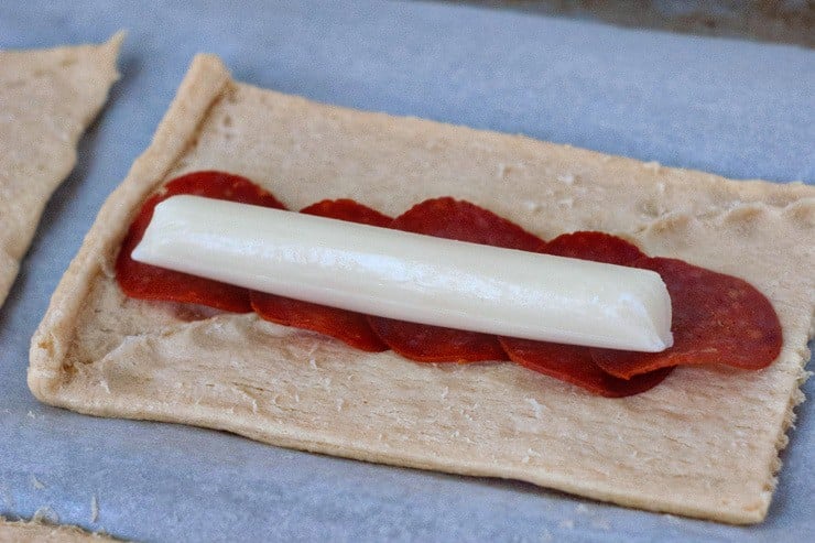 Easy Pizza Sticks stuffed with mozzarella and pepperoni