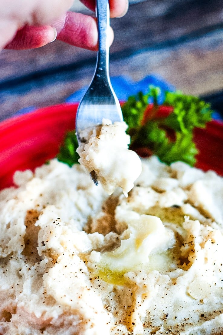 A forkful of the best slow cooker mashed potatoes