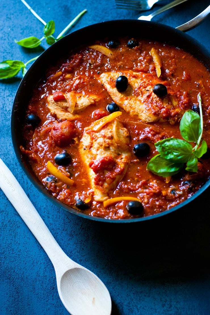 Easy Chicken Cacciatore cooked in a skillet with peppers and onions