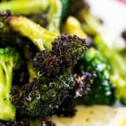 Ready for the most incredible roasted broccoli and easiest dinner of your life? This broccoli lives up to it's name and the chicken is so easy to make! Dinner will be done in under an hour with very little prep and you'll have many happy tummies around your dinner table! ** Post Sponsored by Barber Foods