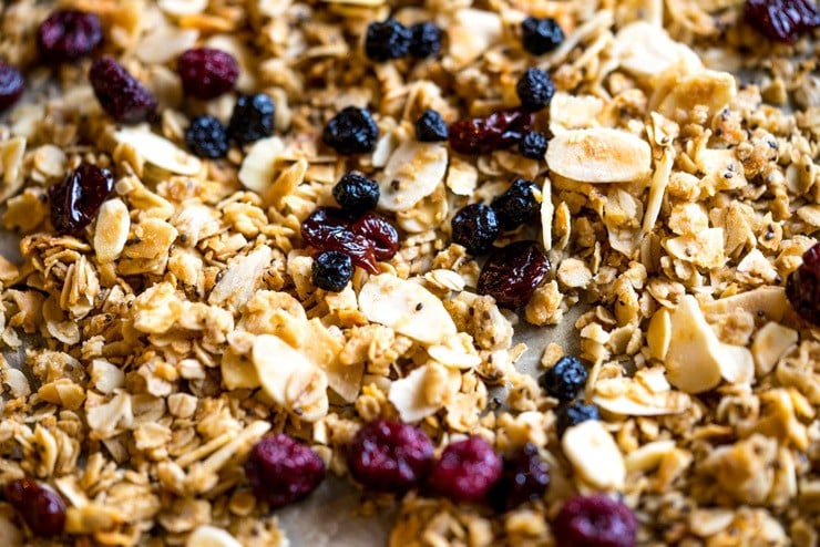 This sweet, salty, crunchy, and chewy coconut oil granola is the perfect breakfast to keep you going strong through the holidays. It's filled with big flakes of unsweetened coconut flakes, oats, whole wheat flour, chia seeds, almonds and studded with sweet dried berries. #GracelandHoliday AD