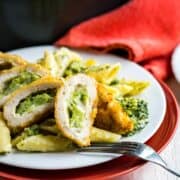 Cheesy Broccoli Pasta and Chicken-- Cheesy pasta, filled with broccoli and topped with crispy stuffed chicken! The pasta comes together in one pan and the chicken goes from the freezer to the table in 35! Made in Partnership with @BarberFoods. #BarberNight