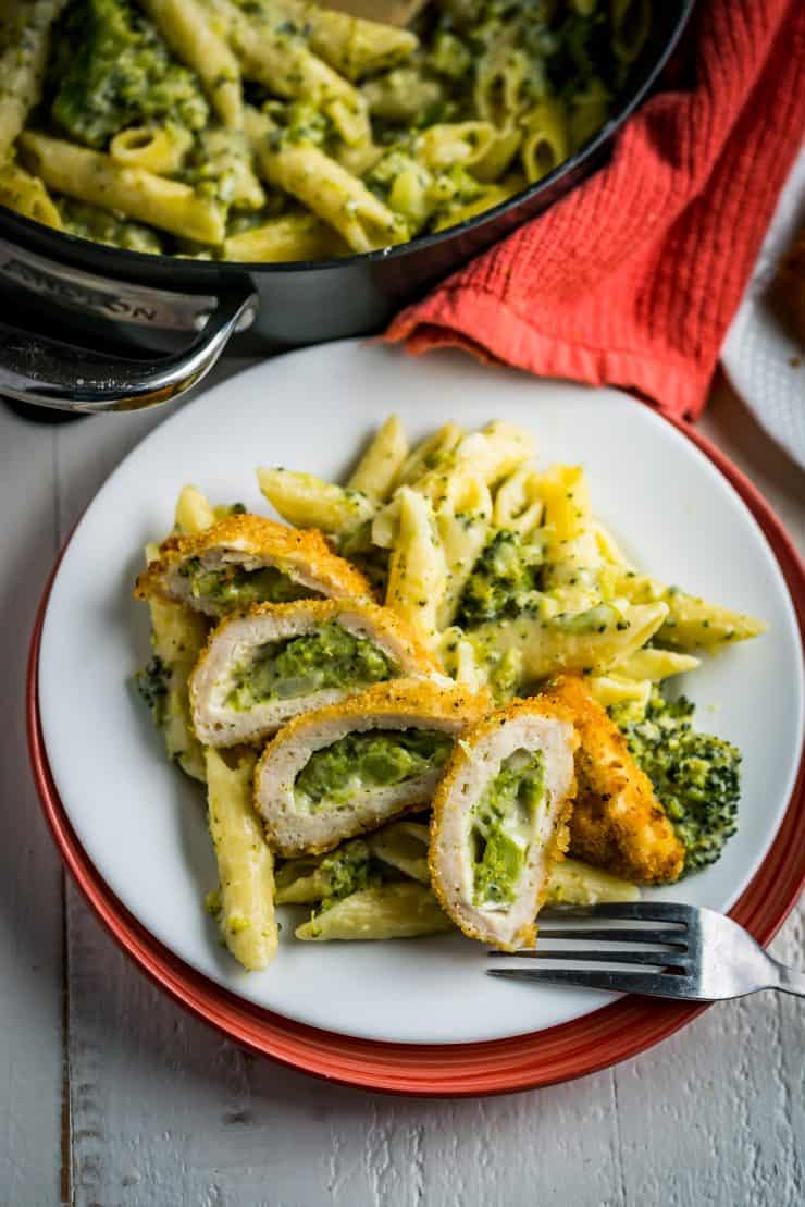 Cheesy Broccoli Pasta and Chicken-- Cheesy pasta, filled with broccoli and topped with crispy stuffed chicken! The pasta comes together in one pan and the chicken goes from the freezer to the table in 35! Made in Partnership with @BarberFoods. #BarberNight