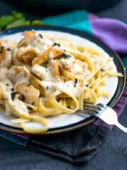 Chicken Fettuccini is a favorite at our house and I'm so excited that I can now make it super quick! Using the Instant Pot cuts the cooking time by more than half and the best part is I only dirty one stinkin' pot. I'm tellin' you this Instant Pot thing is a game changer, especially for this Instant Pot Chicken Fettuccini Alfredo.