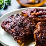 These Instant Pot BBQ ribs are the perfect recipe to make to break in your Instant Pot! They are so easy to make and taste like they've been slow-roasting for hours. Tender, fall-off-the-bone perfection!