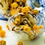You may be a skeptic, but cheese popcorn is MEANT for ice cream sundaes! Especially when paired with the best homemade hot fudge and homemade caramel sauce! It's sweet n' salty goodness, friends!