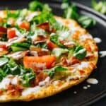 I can't get enough of this BLT Margherita Pizza! It's so easy to throw together and gives pizza a light, crisp make-over for the spring and summer! A must make!