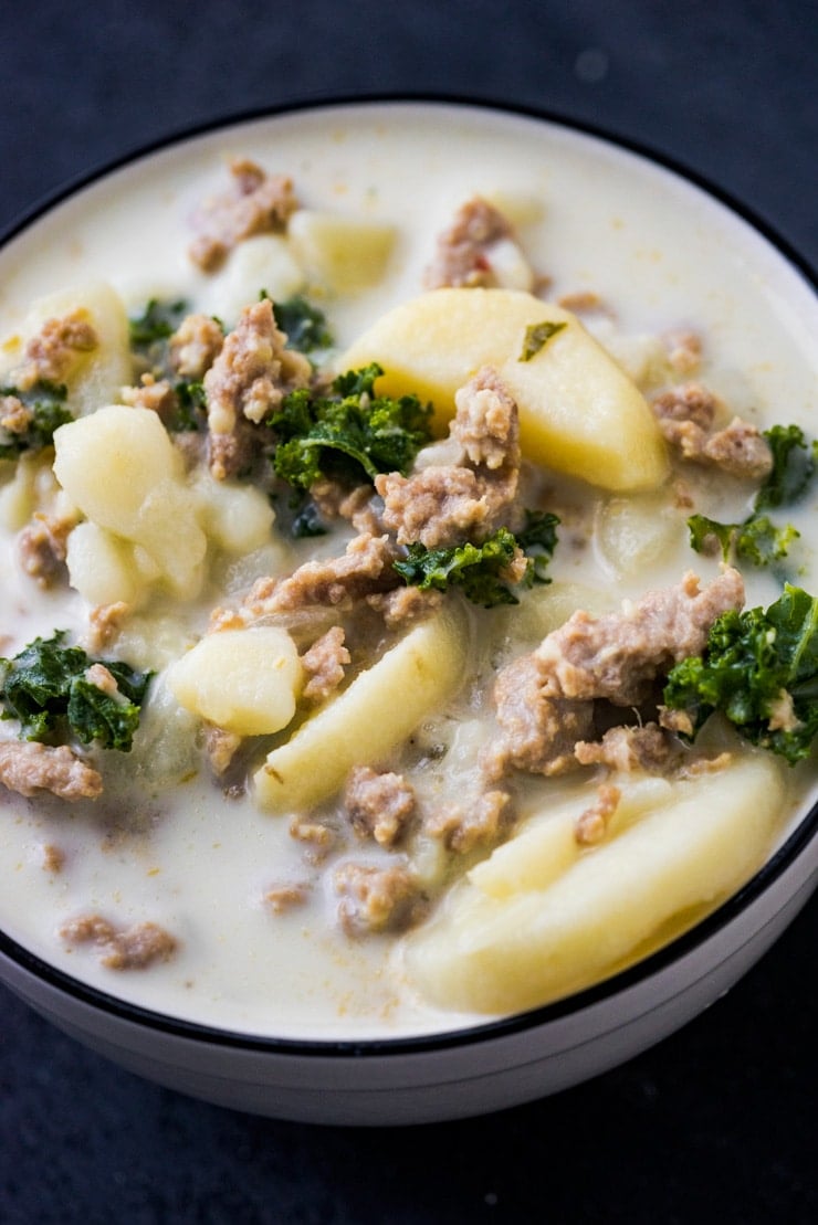 Cozy up this fall with these Four Instant Pot Soup Recipes that only take 7 minutes to cook! Zuppa Toscana, Stuffed Bell Pepper, Cheesy Potato, and Chicken Dumpling.