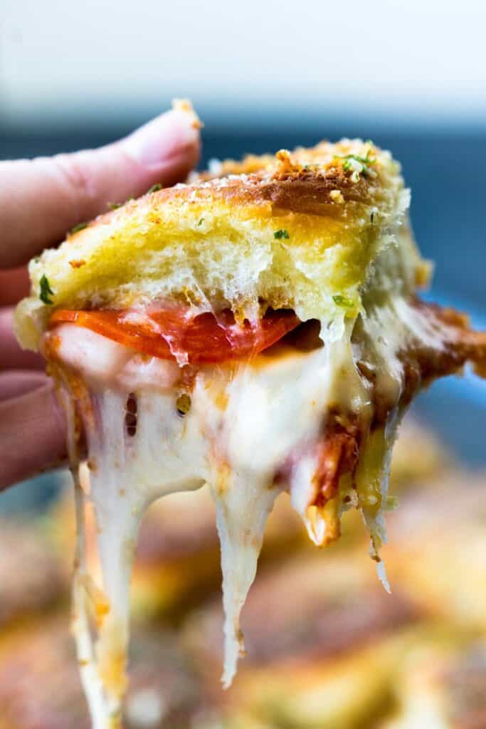 Easy Hawaiian Roll Pizza Sliders-- perfect to make ahead for parties!