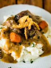 Instant Pot Pot Roast-- A Sunday dinner-worthy meal made in about an hour thanks to the Instant Pot and just a handful of ingredients.