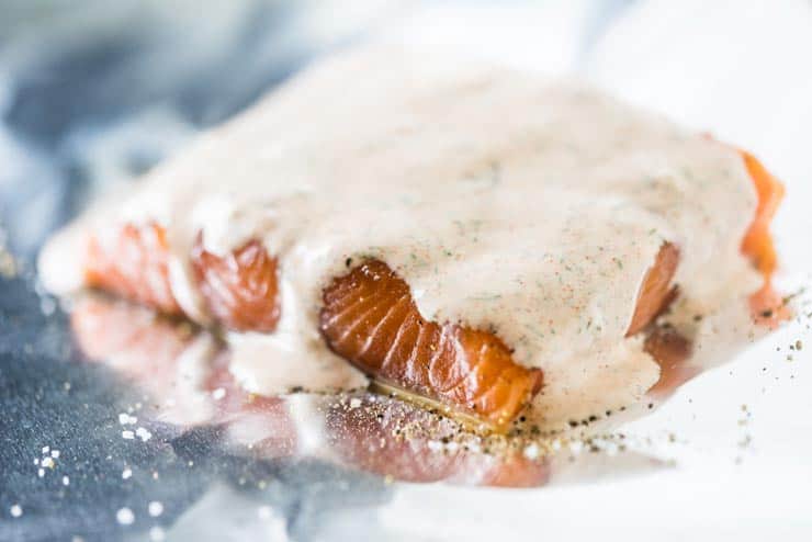 Salmon with a mayonnaise sauce on it just before broiling