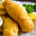 Battered white fish on parchment paper