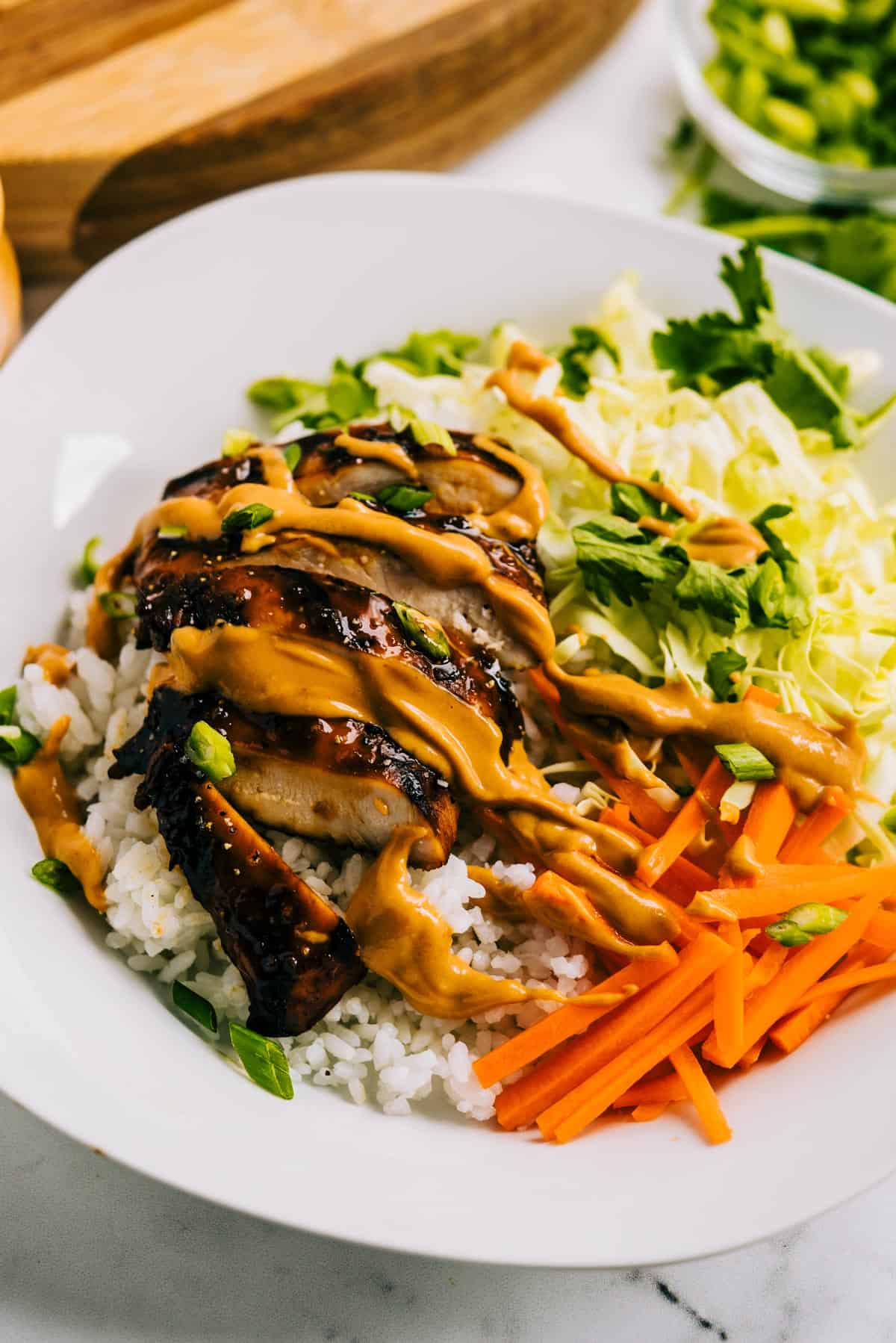 Thai Chicken Bowl with rice and peanut sauce